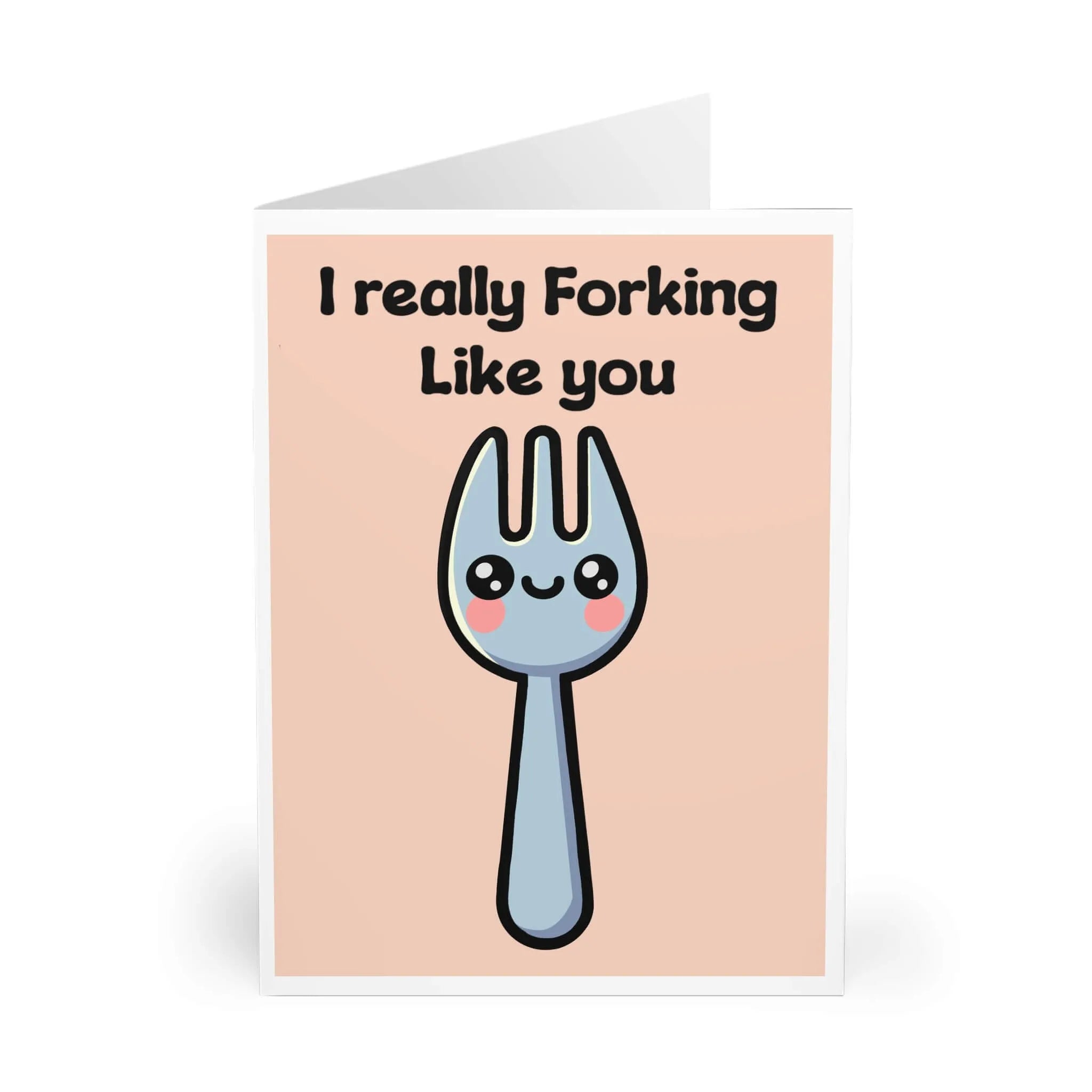 A cute, pun-themed greeting card featuring a smiling cartoon spork with rosy cheeks on a pastel peach background. The card displays the phrase, "I really Forking Like You" in playful, bold black text. This lighthearted and humorous design makes it an ideal choice for expressing affection in a fun and unique way.