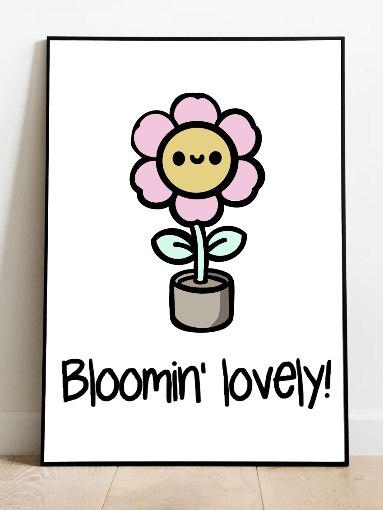 Introducing the "Bloomin' Lovely Print" – a delightful touch of British charm that's sure to bring a smile to your face! This adorable cartoon-style flower showcases a cheerful pink bloom with the happiest little face, all nestled in its cozy gray pot. The playful phrase "Bloomin' lovely!" dances beneath it, capturing the essence of positivity and growth. Perfectly placed on a light wooden floor against a crisp white wall, this print is just waiting to brighten up your space with its whimsical vibe.  KEOLIX