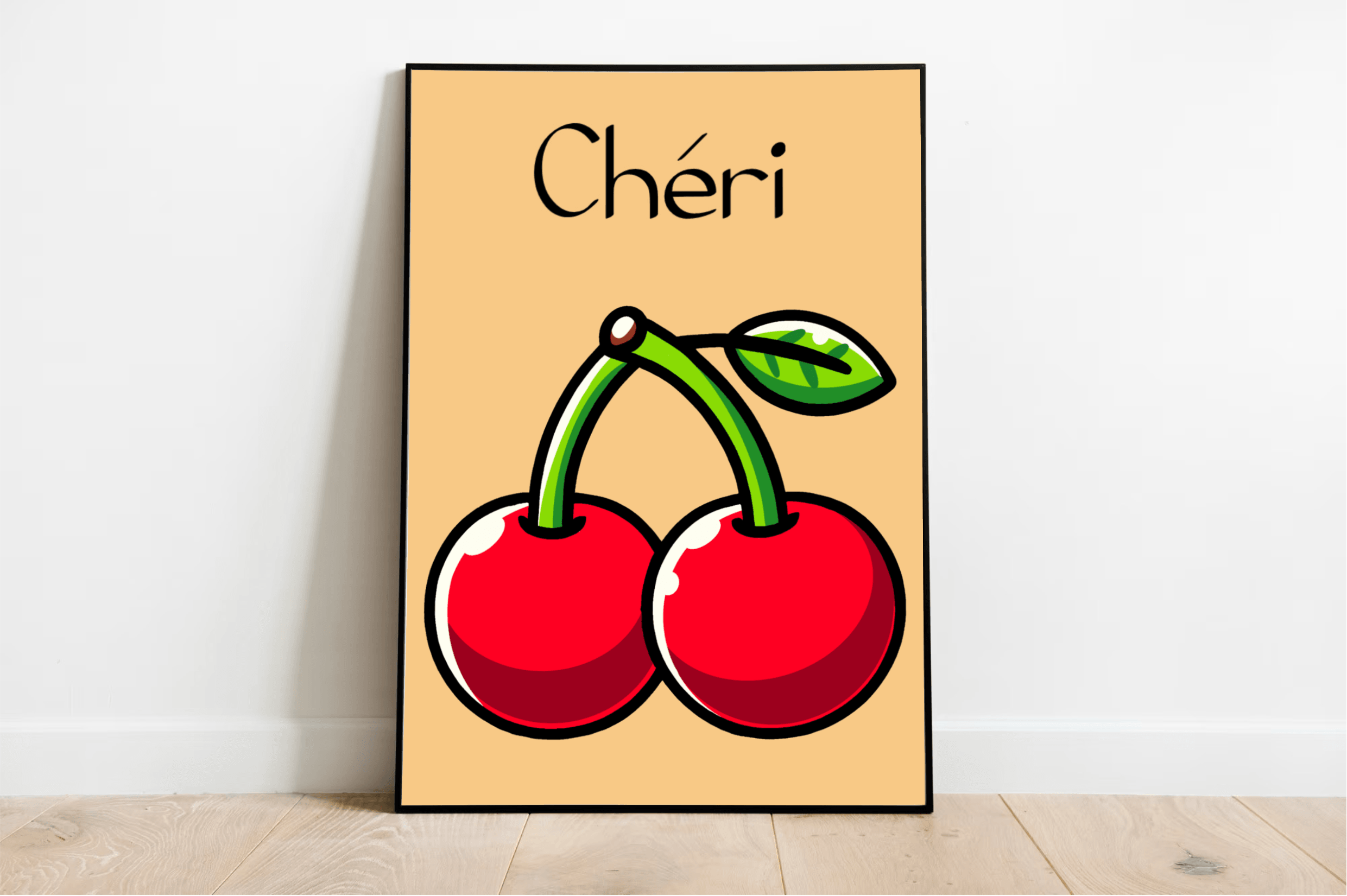 Introducing the vibrant Chéri Red Cherry Print—where two luscious red cherries with fresh green leaves pop against a soft peach background, all elegantly framed. The word "Chéri" is artistically styled in bold black right above the image, adding a touch of charm. This eye-catching artwork rests gracefully on a wooden floor against a crisp white wall, filling any space with lively creativity and character.