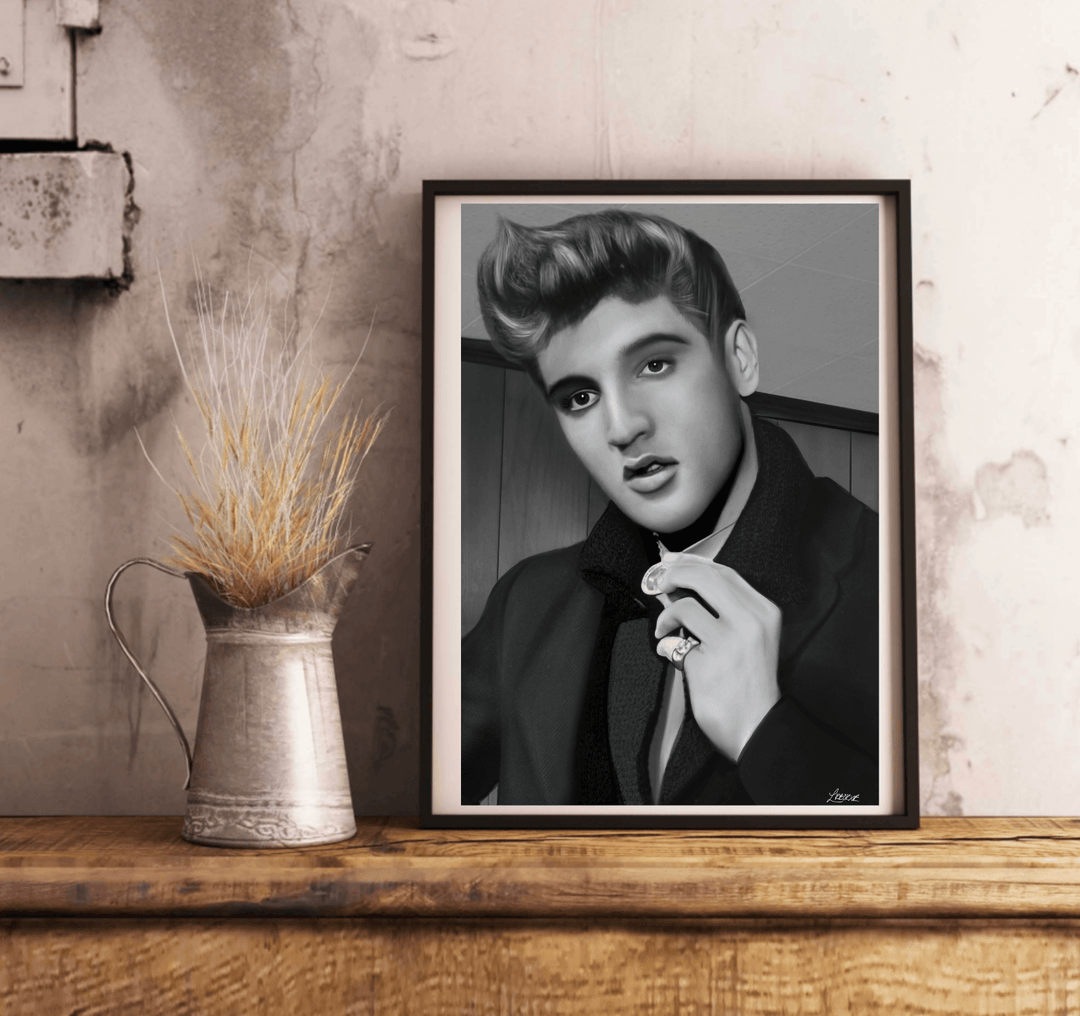 Discover the magic of The King with our stunning black and white portrait, aptly named "The King Forever - Handcrafted Elvis Print." This captivating artwork beautifully captures a young man channeling an Elvis vibe, complete with perfectly styled hair and an intense pose. Dressed in a sleek suit, he brings an air of mystery as he holds a ring to his lips. Even unframed, this print commands attention as it leans elegantly against a crisp white wall on a light wood floor. Its superior printing quality highli