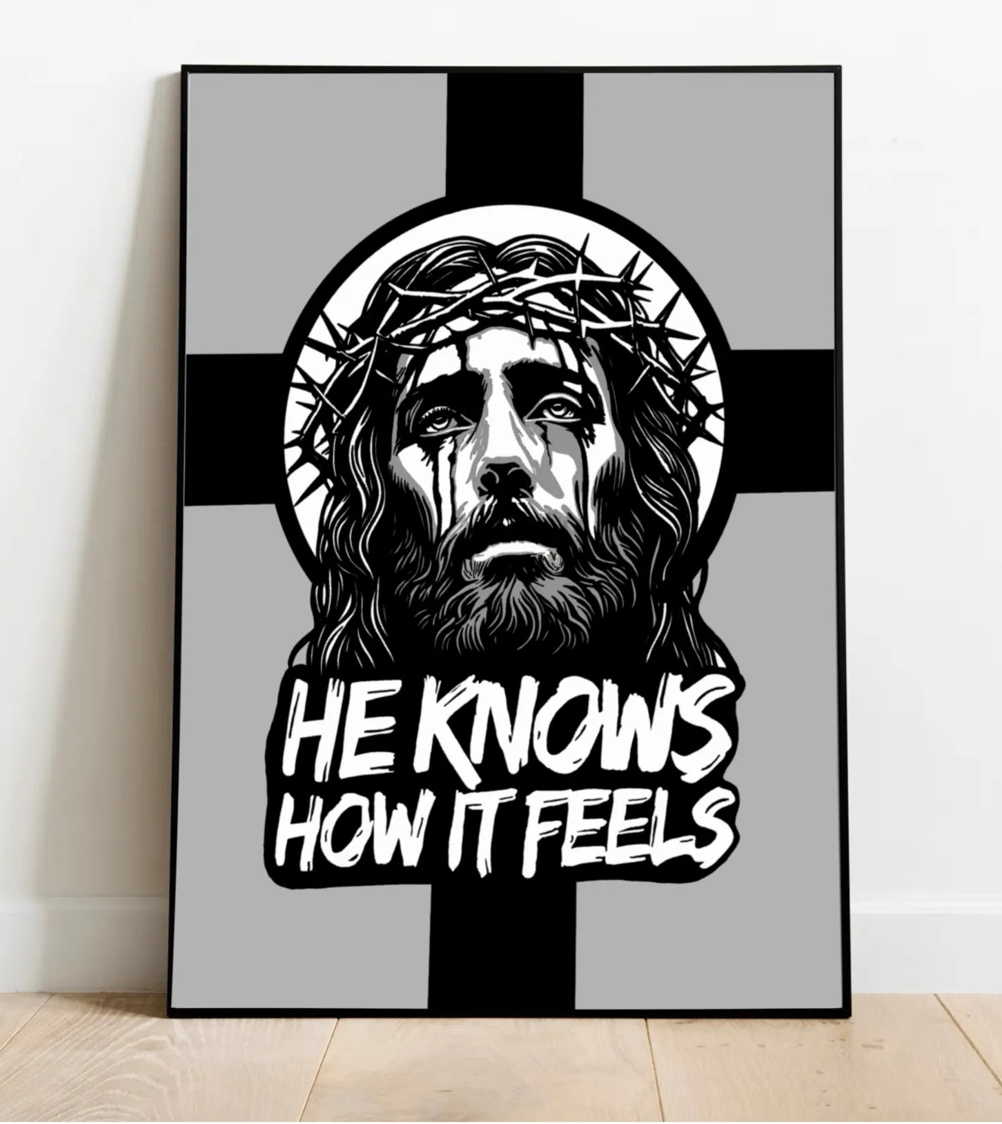 He Knows How It Feels" - A striking monochrome illustration of Jesus Christ, crowned with thorns, with tear-like shadows, symbolizing divine empathy and suffering.