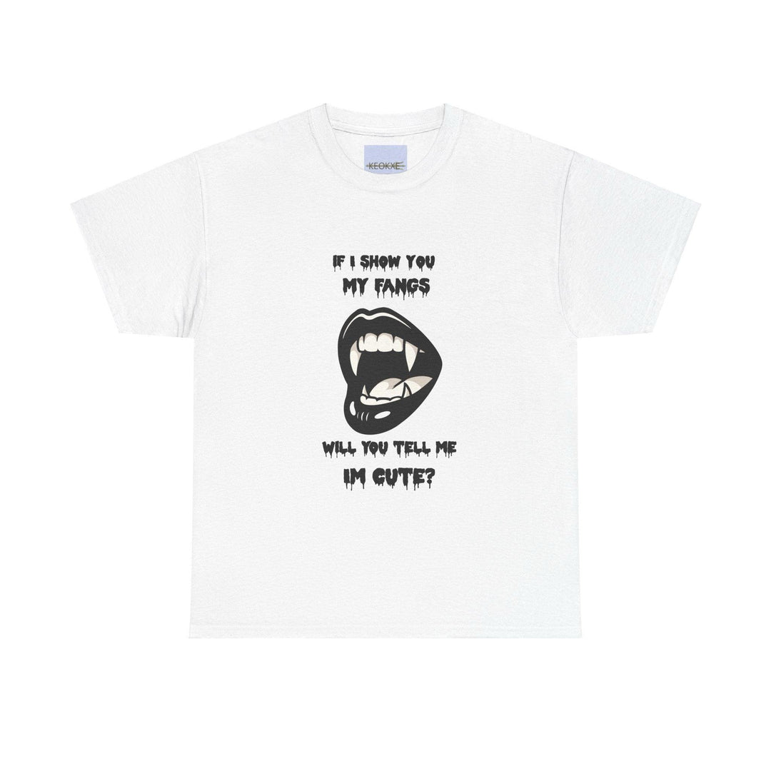 White T-shirt featuring a cartoon vampire smile with fangs, along with the phrase 'If I Show You My Fangs, Will You Tell Me I'm Cute?' A playful, gothic-inspired design for those who love quirky humor.