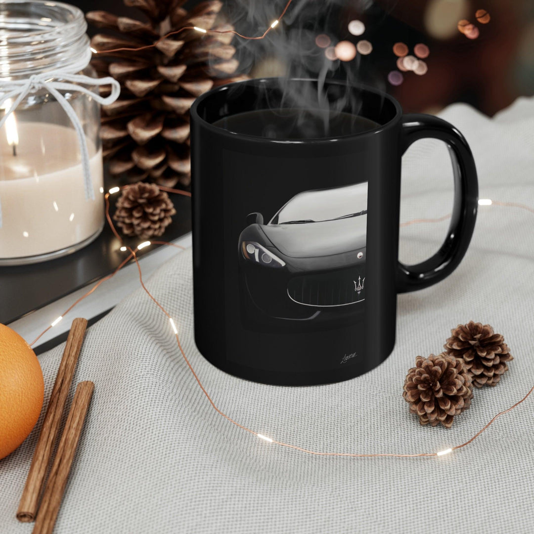Stylish black ceramic mug that reveals a Maserati car design when heated, perfect for luxury car enthusiasts who enjoy a touch of surprise with their coffee.