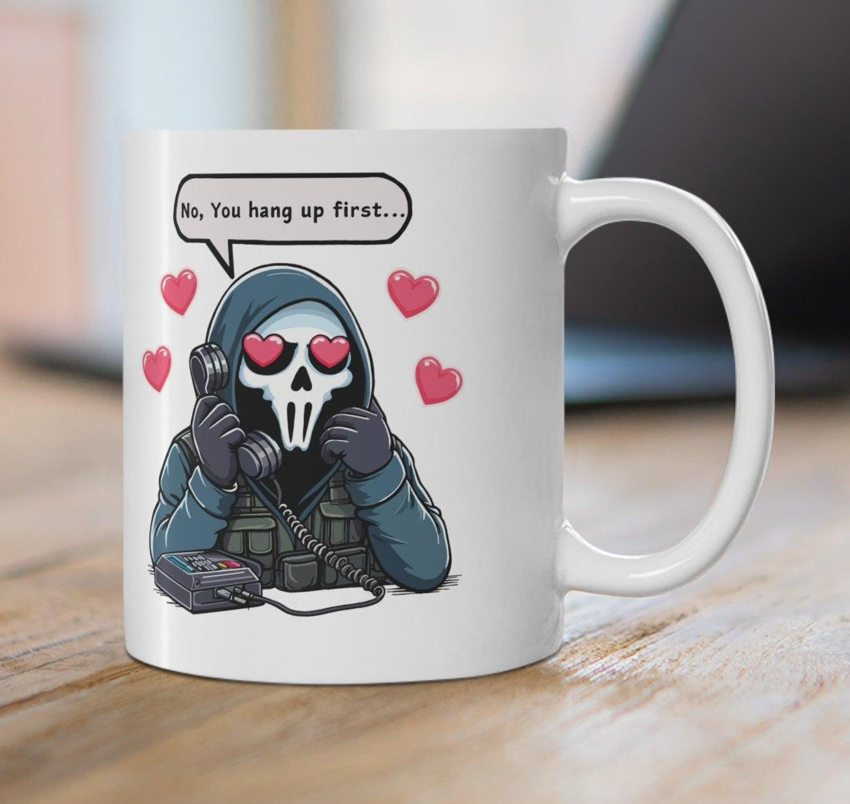 White ceramic mug featuring a cute cartoon couple in a sweet exchange with the phrase 'No, You Hang Up First,' perfect for couples who love playful banter KEOLIX 