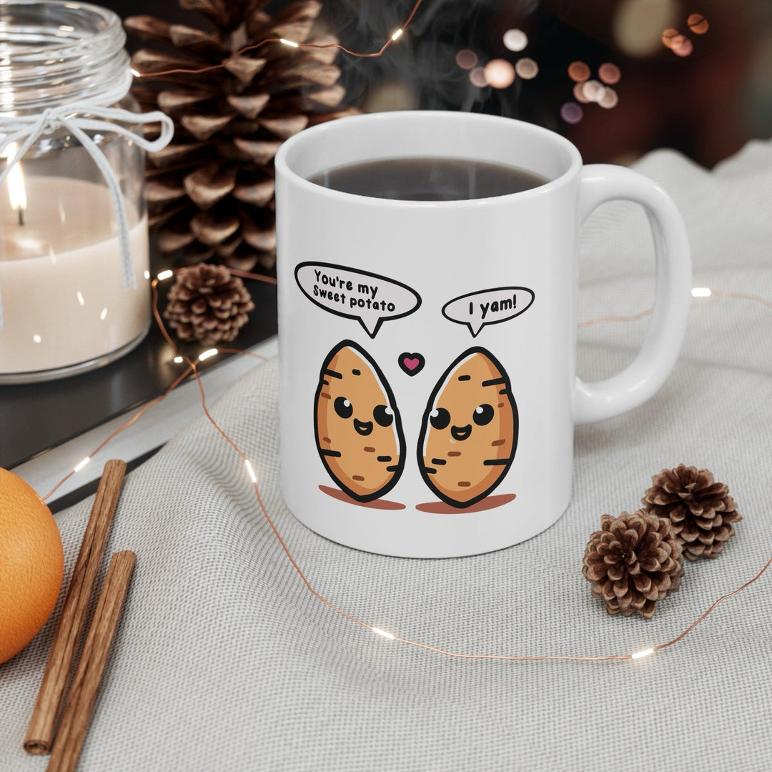 Fun white ceramic mug with two cartoon yams and a pun-filled text bubble, perfect for fans of playful and food-themed designs.