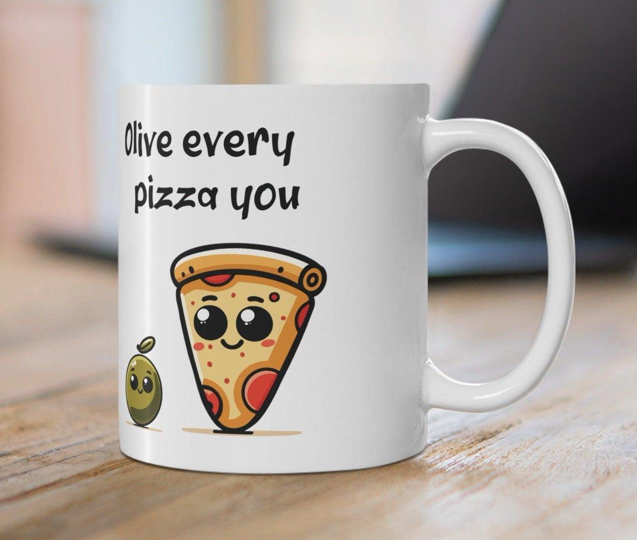 Cute white ceramic mug featuring a slice of pizza with the playful pun 'Olive Every Pizza You,' making it the perfect gift for pizza lovers.