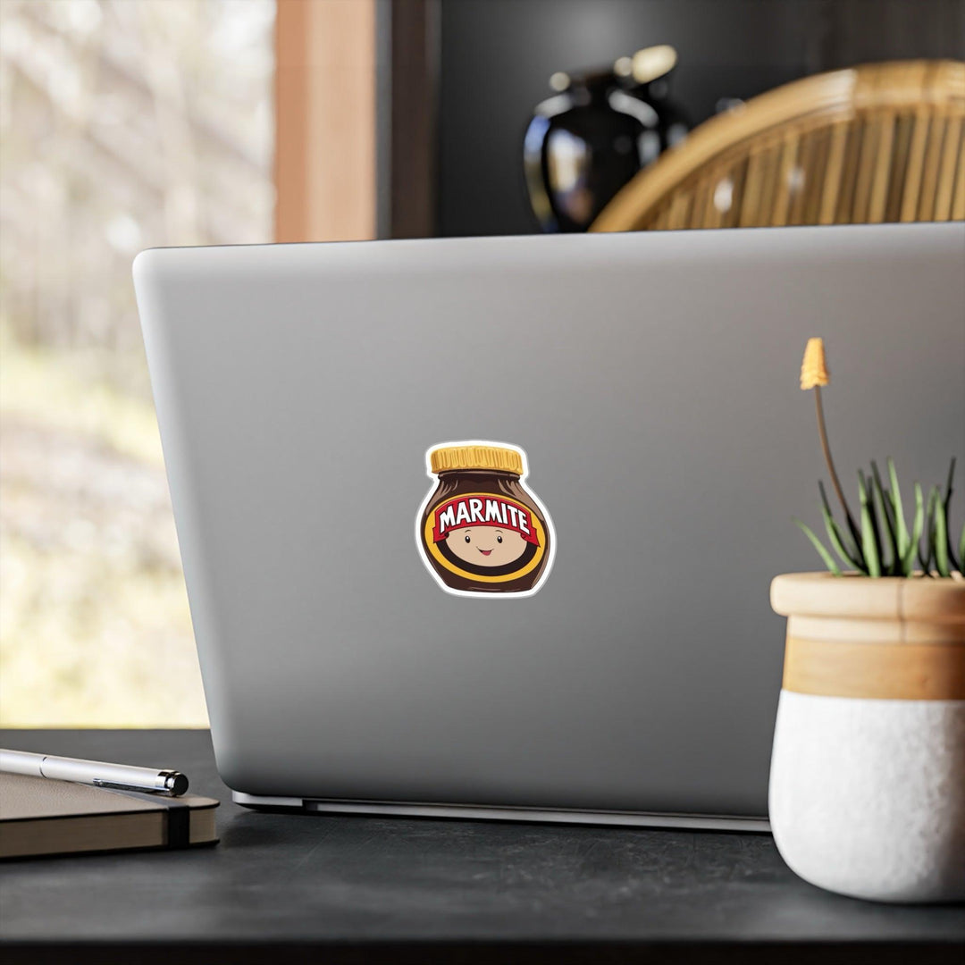 Fun waterproof sticker featuring a smiling Marmite jar with a face. Ideal for fans of this iconic spread, perfect for laptops, notebooks, or water bottles - Baby Keo