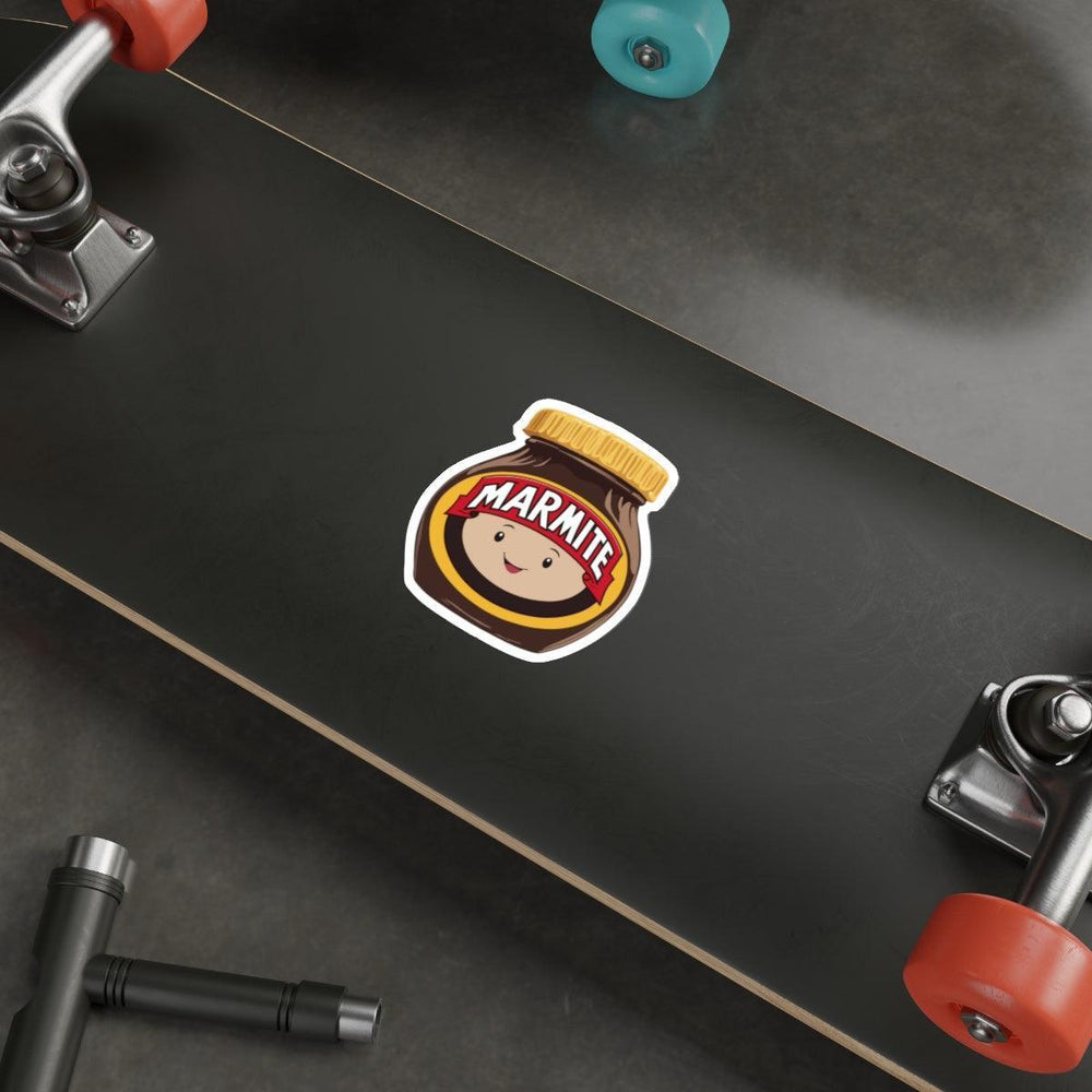 Fun waterproof sticker featuring a smiling Marmite jar with a face. Ideal for fans of this iconic spread, perfect for laptops, notebooks, or water bottles - Baby Keo