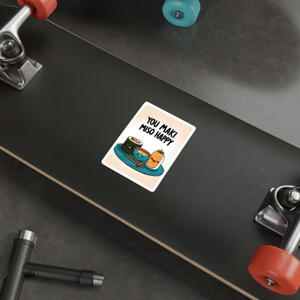You Maki Miso Happy Waterproof Stickers KEOLIX  This sticker features two adorable cartoon bowls of miso soup, smiling warmly. Below them, the pun "You Maki Miso Happy" adds a fun touch to this cute kitchen-themed sticker.