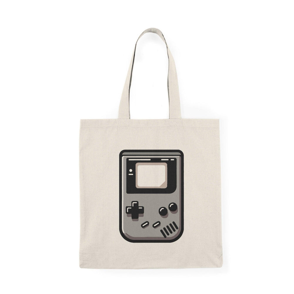 Tote bag featuring a nostalgic design inspired by the classic Game Boy, complete with iconic buttons and a retro screen. The vibrant colors and playful graphics evoke a sense of fun and nostalgia, making it a perfect accessory for gamers and anyone who loves vintage video games."

