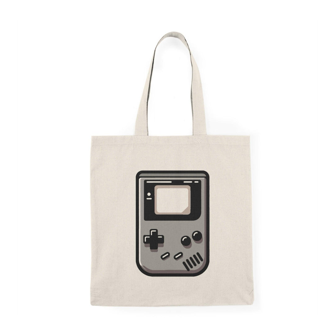 Tote bag featuring a nostalgic design inspired by the classic Game Boy, complete with iconic buttons and a retro screen. The vibrant colors and playful graphics evoke a sense of fun and nostalgia, making it a perfect accessory for gamers and anyone who loves vintage video games."

