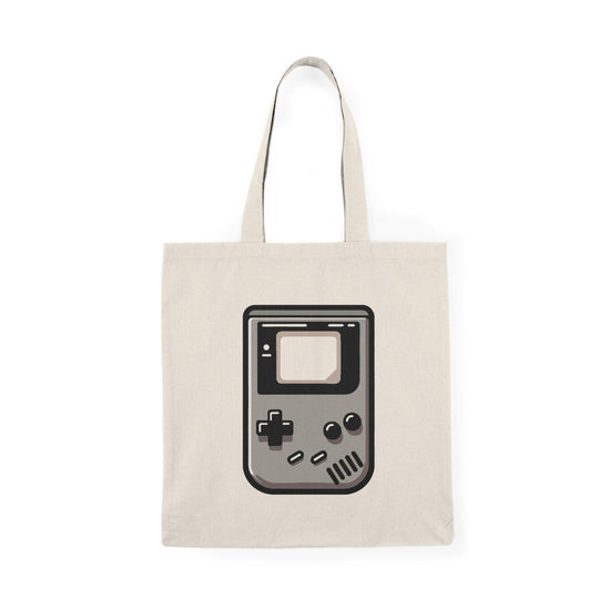 Tote bag featuring a nostalgic design inspired by the classic Game Boy, complete with iconic buttons and a retro screen. The vibrant colors and playful graphics evoke a sense of fun and nostalgia, making it a perfect accessory for gamers and anyone who loves vintage video games."

