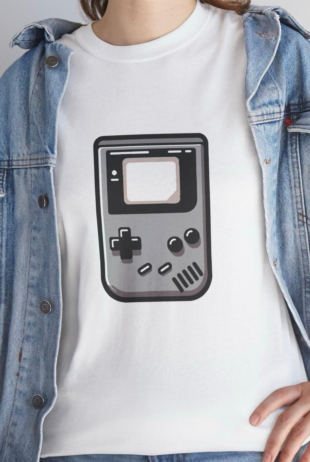 White T-shirt featuring a retro-style illustration of a classic Gameboy console. A nostalgic design for video game lovers and fans of vintage gaming consoles."