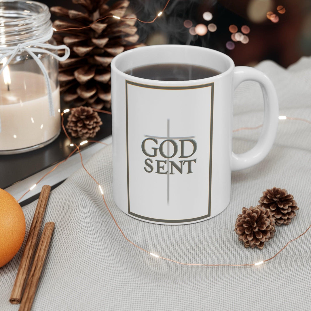 Simple and elegant white ceramic mug with the bold text 'GODSENT,' making it a thoughtful gift for those with a faith-based perspective