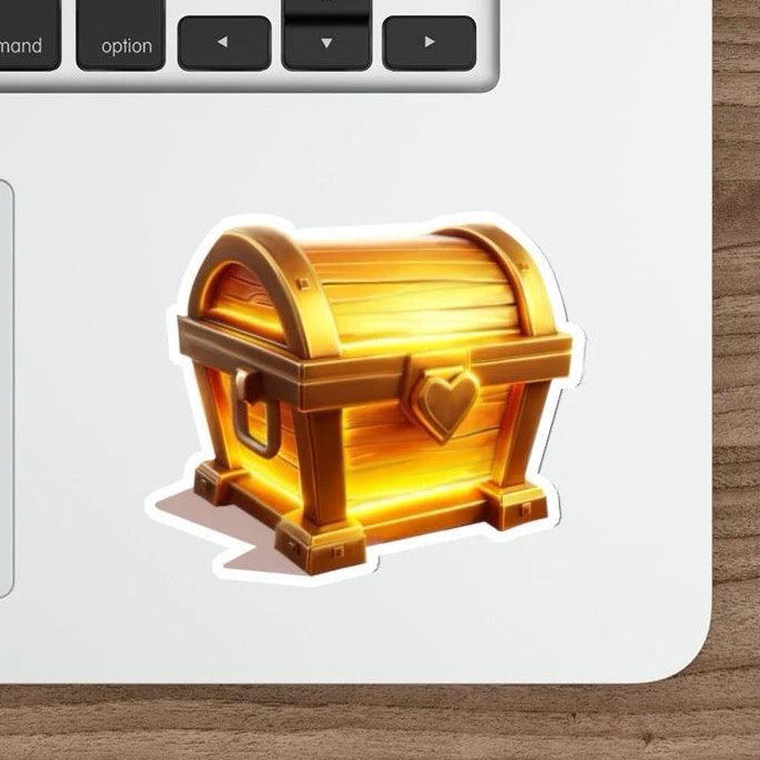 The Enchanted Chest Waterproof Sticker: A gold treasure chest design that gives off magical vibes. Perfect for anyone who loves fantasy or treasure hunts. KEOLIX 