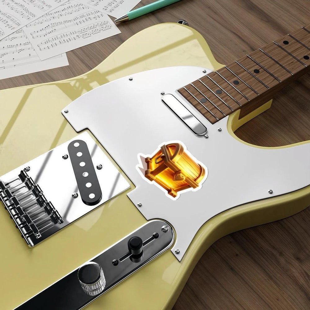 The Enchanted Chest Waterproof Sticker: A gold treasure chest design that gives off magical vibes. Perfect for anyone who loves fantasy or treasure hunts. Baby Keo.