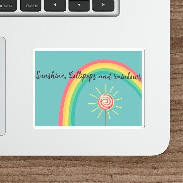 Sunshine, Lollipops, and Rainbows Waterproof Sticker: A circular sticker featuring a bright rainbow with a shining sun, capturing a happy, playful aesthetic. Ideal for personalizing laptops, water bottles, and more. KEOLIX 