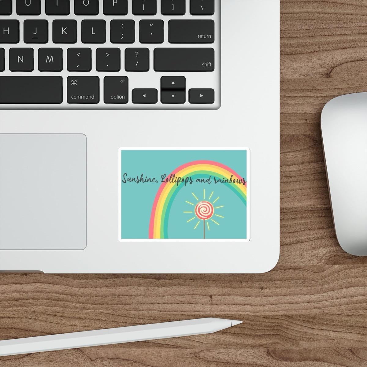 Sunshine, Lollipops, and Rainbows Waterproof Sticker: A circular sticker featuring a bright rainbow with a shining sun, capturing a happy, playful aesthetic. Ideal for personalizing laptops, water bottles, and more. KEOLIX 