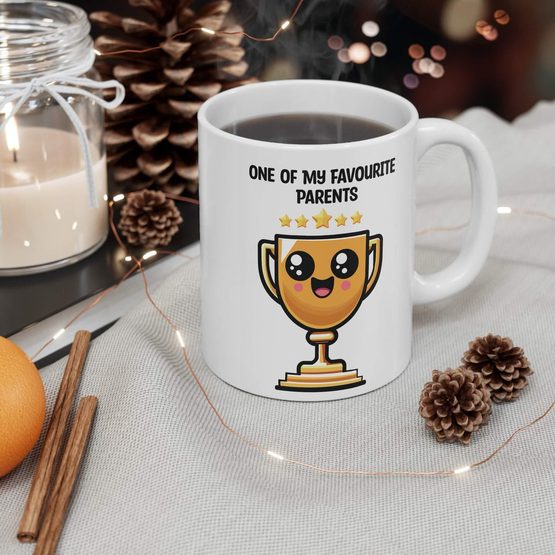 White ceramic mug featuring a trophy design and the text 'One of My Favourite Parents,' a fun and lighthearted gift for parents