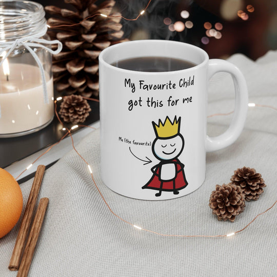 Cute white ceramic mug with a cartoon child character and the text &