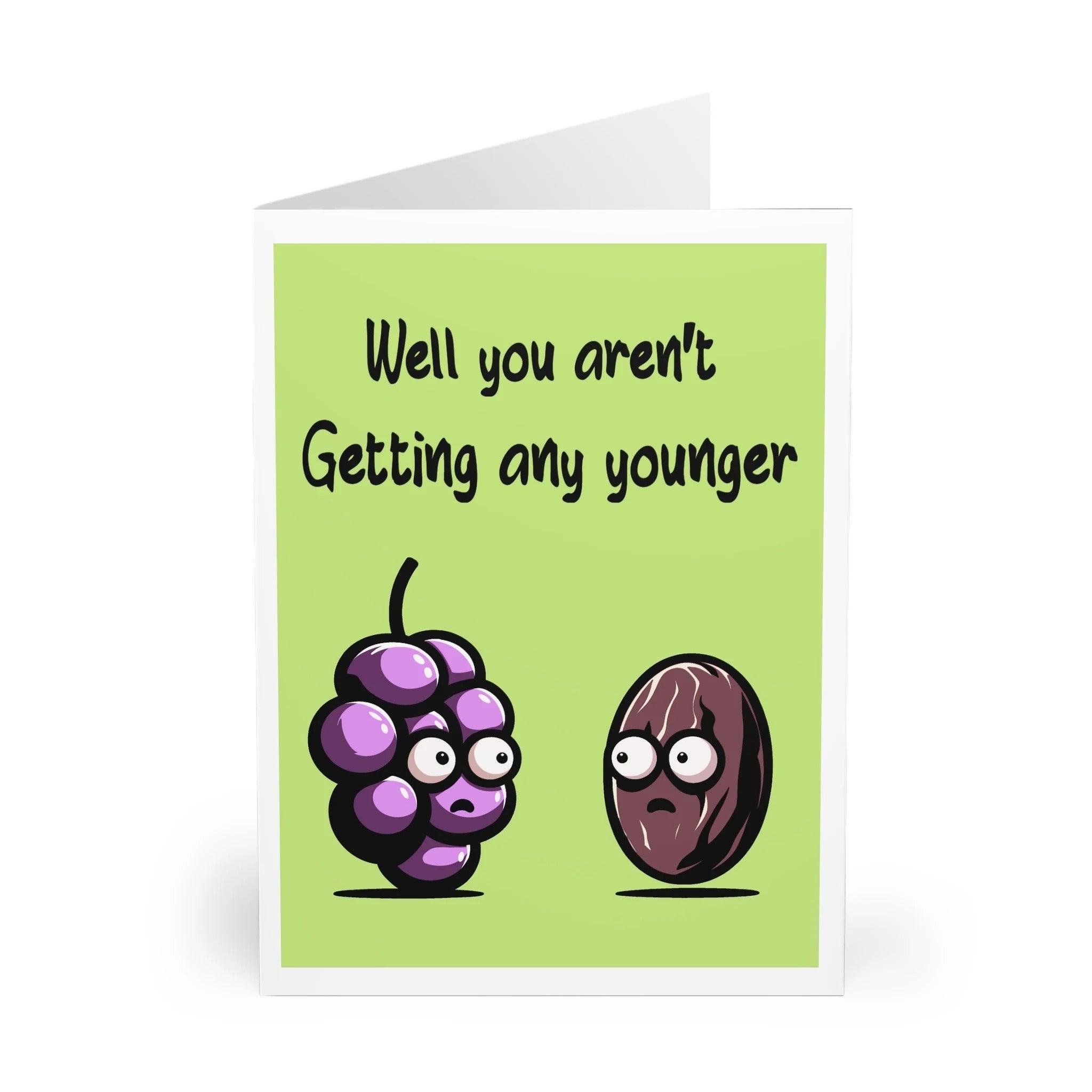 Funny card featuring a grape character and the phrase 'Well You’re Not Getting Any Younger.' A lighthearted way to poke fun at aging - Baby Keo