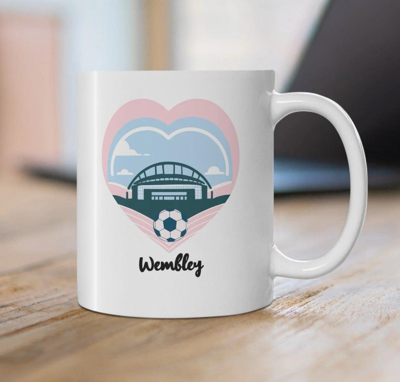 White ceramic mug with a design featuring Wembley stadium, ideal for fans of iconic British landmarks and events KEOLIX 