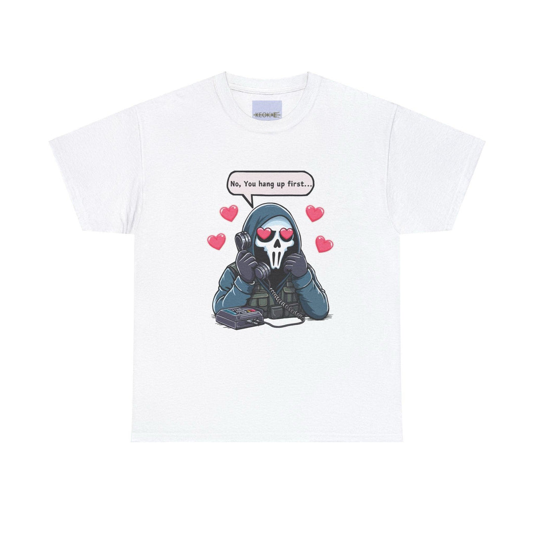 White T-shirt featuring a cartoon ghost with a phone, surrounded by hearts and the phrase 'No, You Hang Up First.' A cute and playful design perfect for fans of cheeky romance and humor