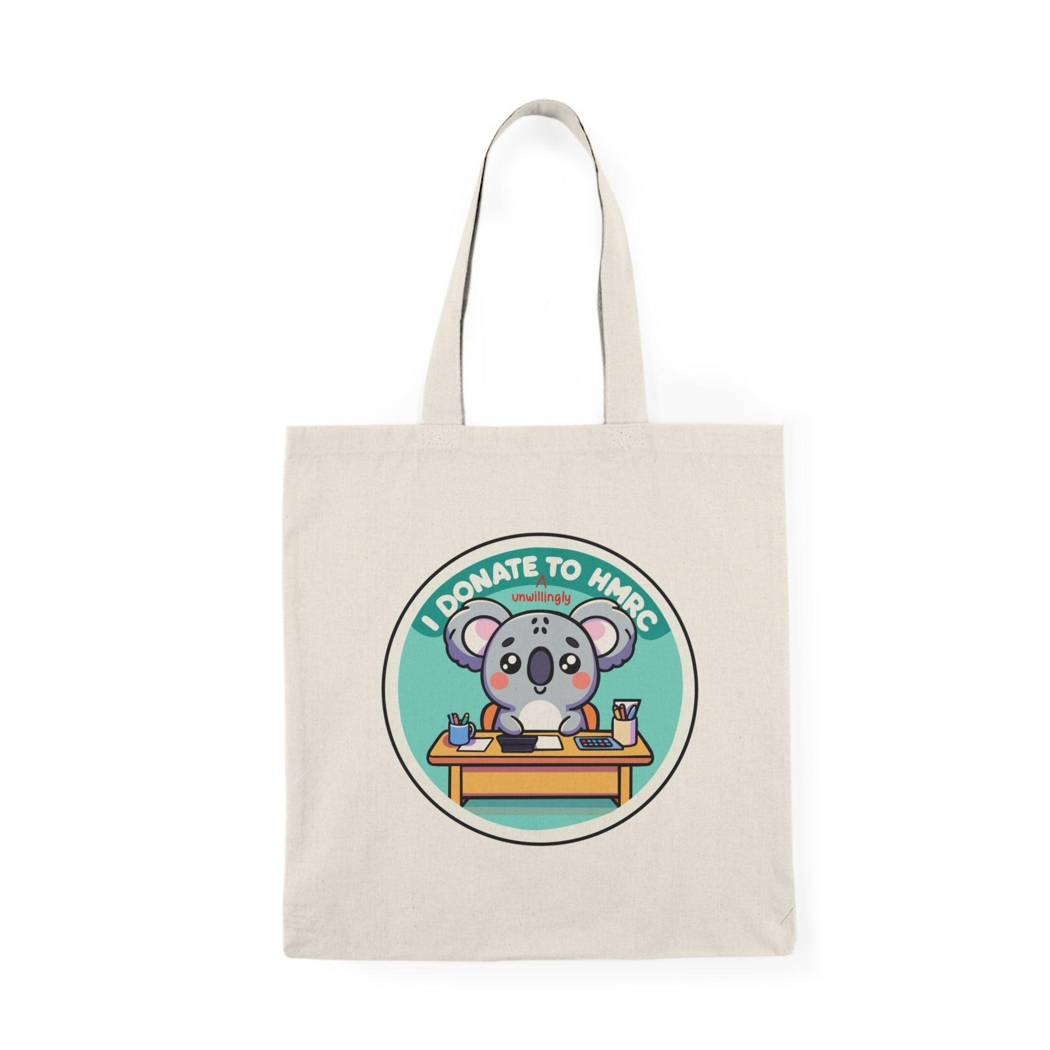 Tote bag featuring a witty design with the phrase 'I Donate Unwillingly to HMRC' in bold typography. The playful and humorous graphics capture a lighthearted take on taxes, making it a fun accessory for those who appreciate cheeky statements while carrying their everyday essentials.
