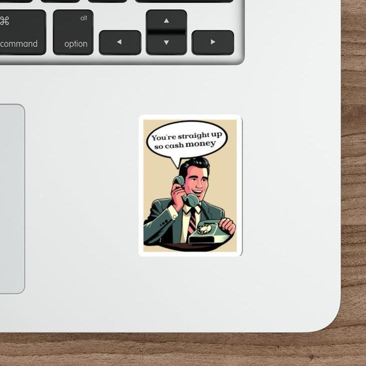 A sticker with an illustration of a man on the phone and the text 'You're Straight Up So Cash Money' placed on a laptop.