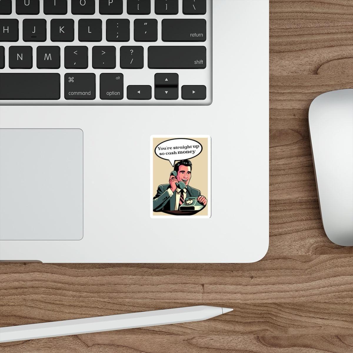 A sticker with an illustration of a man on the phone and the text 'You're Straight Up So Cash Money' placed on a laptop.