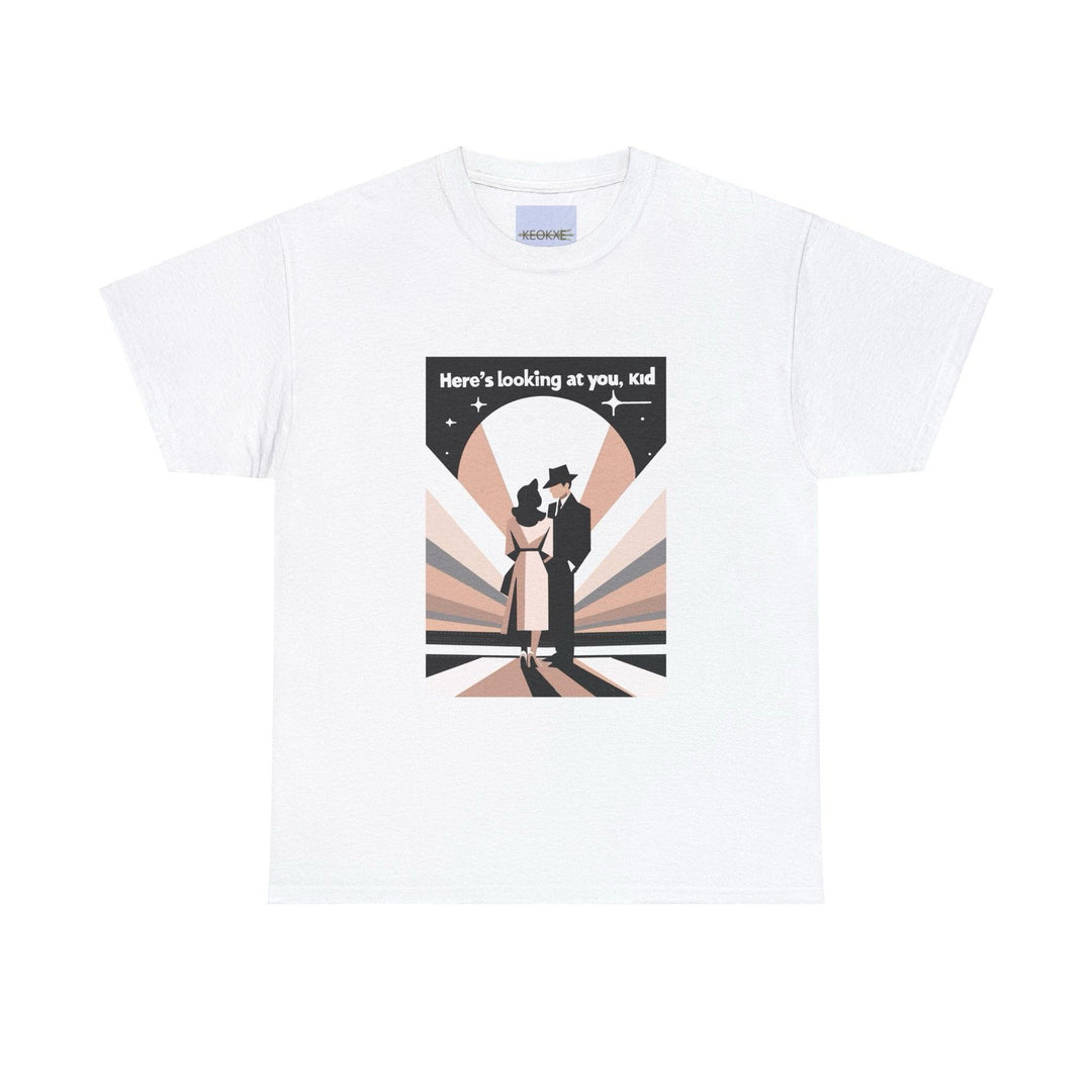 White T-shirt showcasing a stylized black-and-white illustration of a famous film scene with the phrase 'Here's to Looking at You, Kid.' A nostalgic design for movie lovers, evoking timeless Hollywood moments