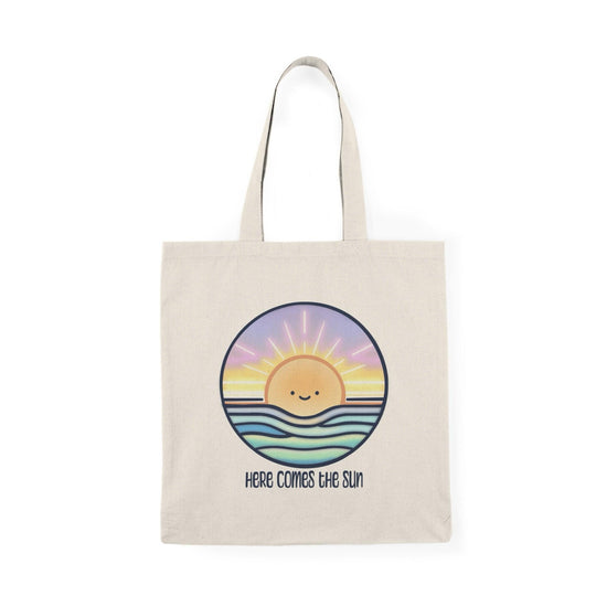 Tote bag featuring a cheerful illustration of a bright sun with a smiling face, surrounded by vibrant rays and colorful elements. The uplifting design embodies positivity and warmth, making it a perfect accessory for sunny days or adding a bright touch to your everyday carry.