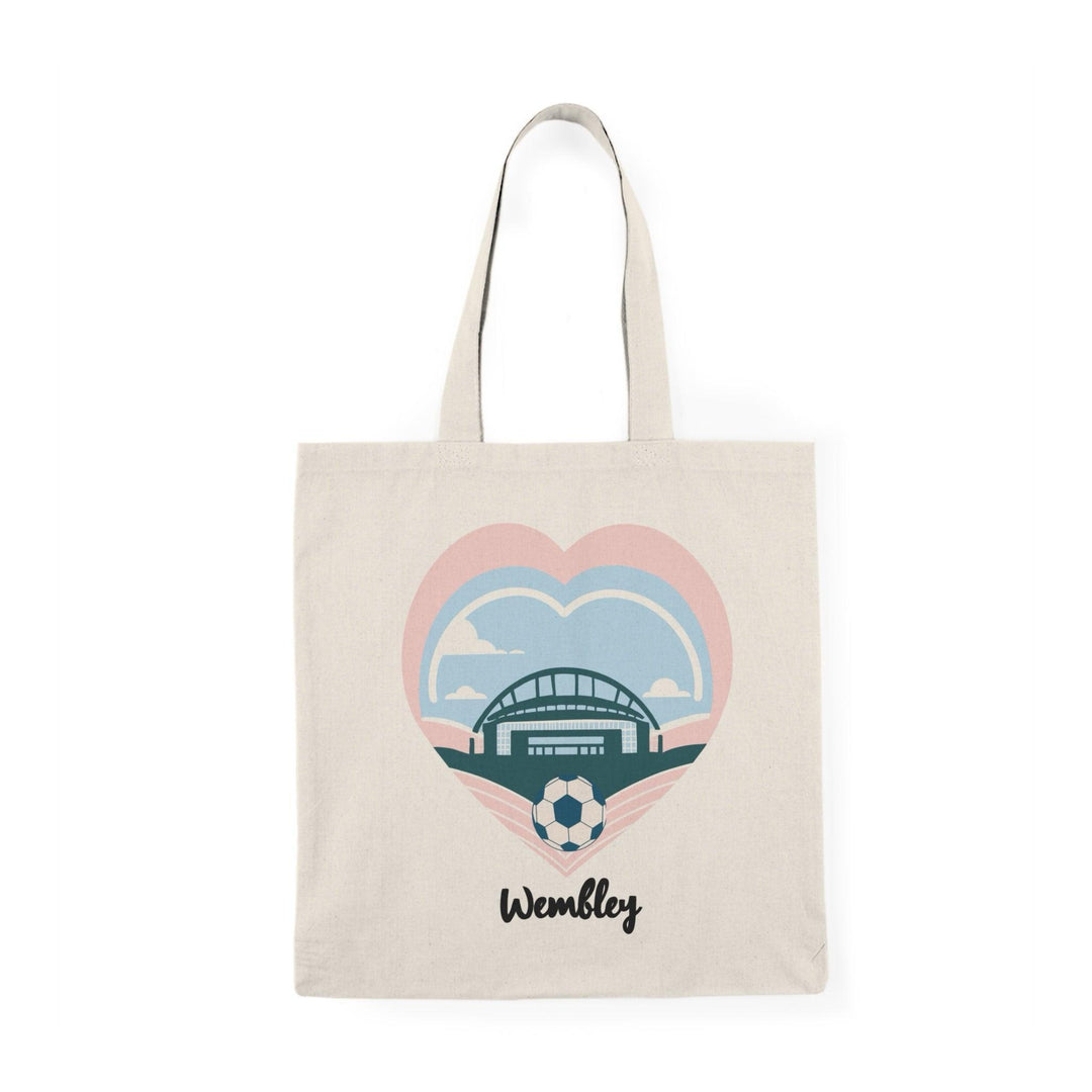 A natural tote bag featuring a graphic illustration of the iconic Wembley Stadium, surrounded by heart motifs. This design celebrates the spirit of the venue, making it a perfect accessory for sports fans and music lovers alike