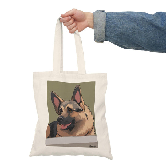 Tote bag featuring a charming illustration of a German Shepherd dog, showcasing its distinctive features and loyal demeanor. The vibrant design and detailed artwork create a perfect accessory for dog lovers, ideal for carrying everyday essentials while celebrating the beauty of this beloved breed."