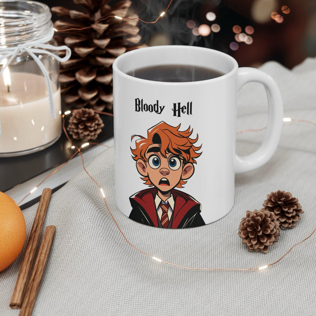 Humorous ceramic mug featuring a red-headed, wide-eyed character in a school uniform, exclaiming 'Bloody Hell!' A perfect gift for fans of British culture or magical-themed worlds, ideal for morning coffee or tea - Baby Keo.