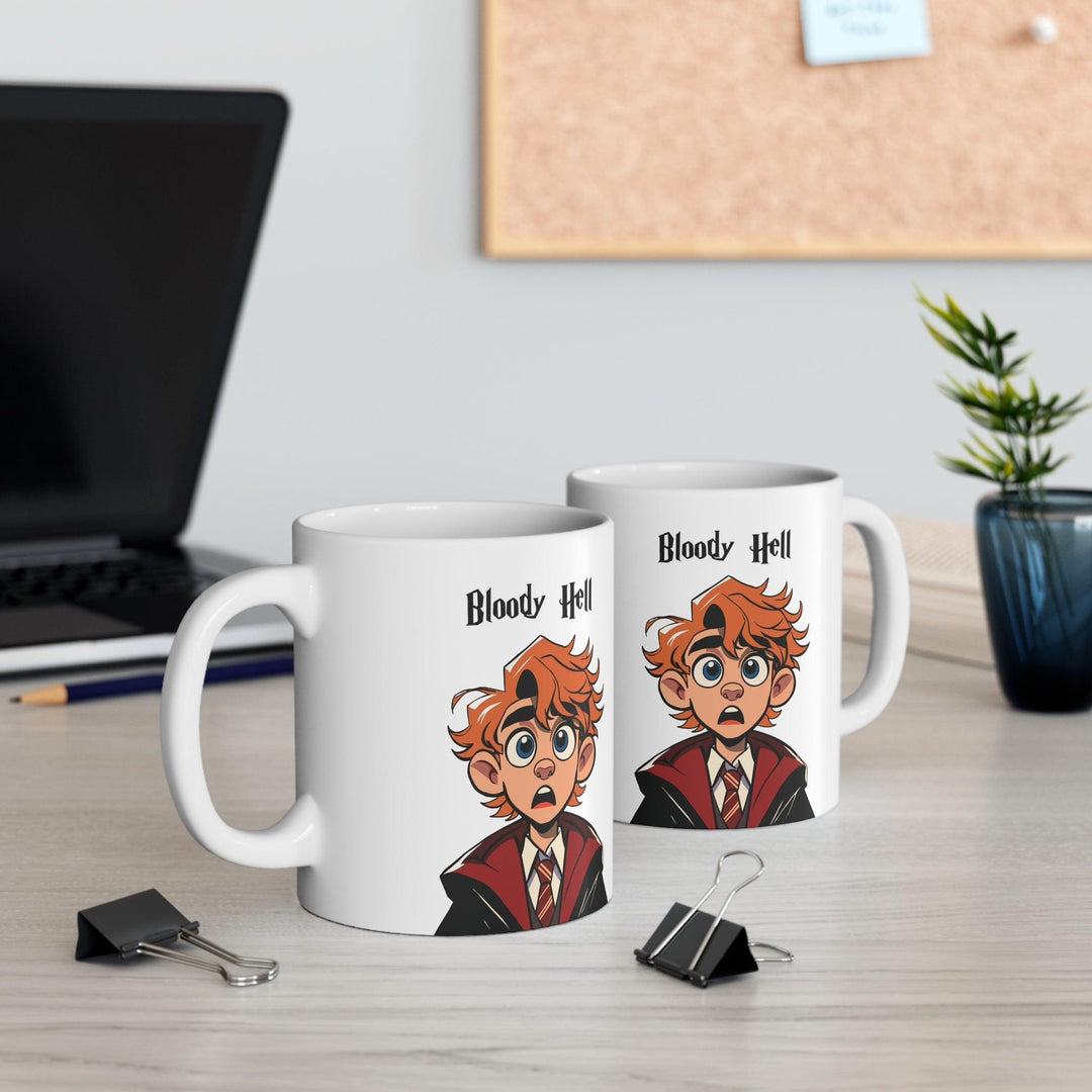 Humorous ceramic mug featuring a red-headed, wide-eyed character in a school uniform, exclaiming 'Bloody Hell!' A perfect gift for fans of British culture or magical-themed worlds, ideal for morning coffee or tea - Baby Keo.