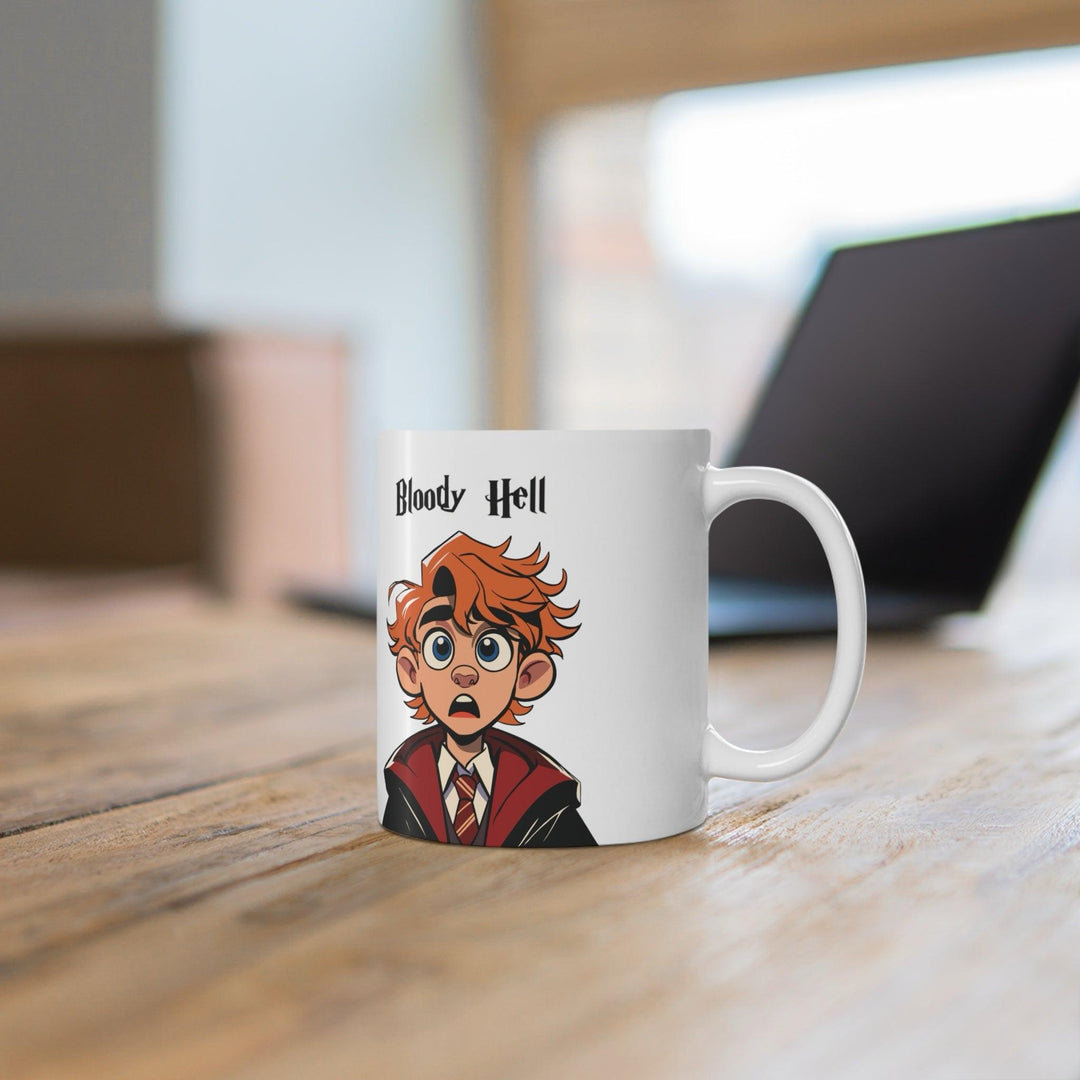 Humorous ceramic mug featuring a red-headed, wide-eyed character in a school uniform, exclaiming 'Bloody Hell!' A perfect gift for fans of British culture or magical-themed worlds, ideal for morning coffee or tea - Baby Keo.