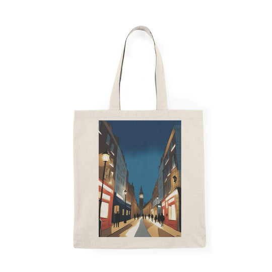 A cream-colored tote bag showcasing a stunning photographic print of a vibrant London nightscape, featuring illuminated buildings and streets. This eye-catching design captures the essence of city life at night, perfect for those who love urban exploration