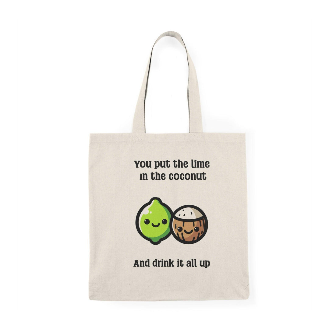 A cream tote bag showcasing a humorous illustration of a smiling lime character with the phrase 'You put the lime in the coconut and drink it all up.' The fun design combines tropical vibes with a cheeky message, ideal for beach lovers and cocktail enthusiasts.