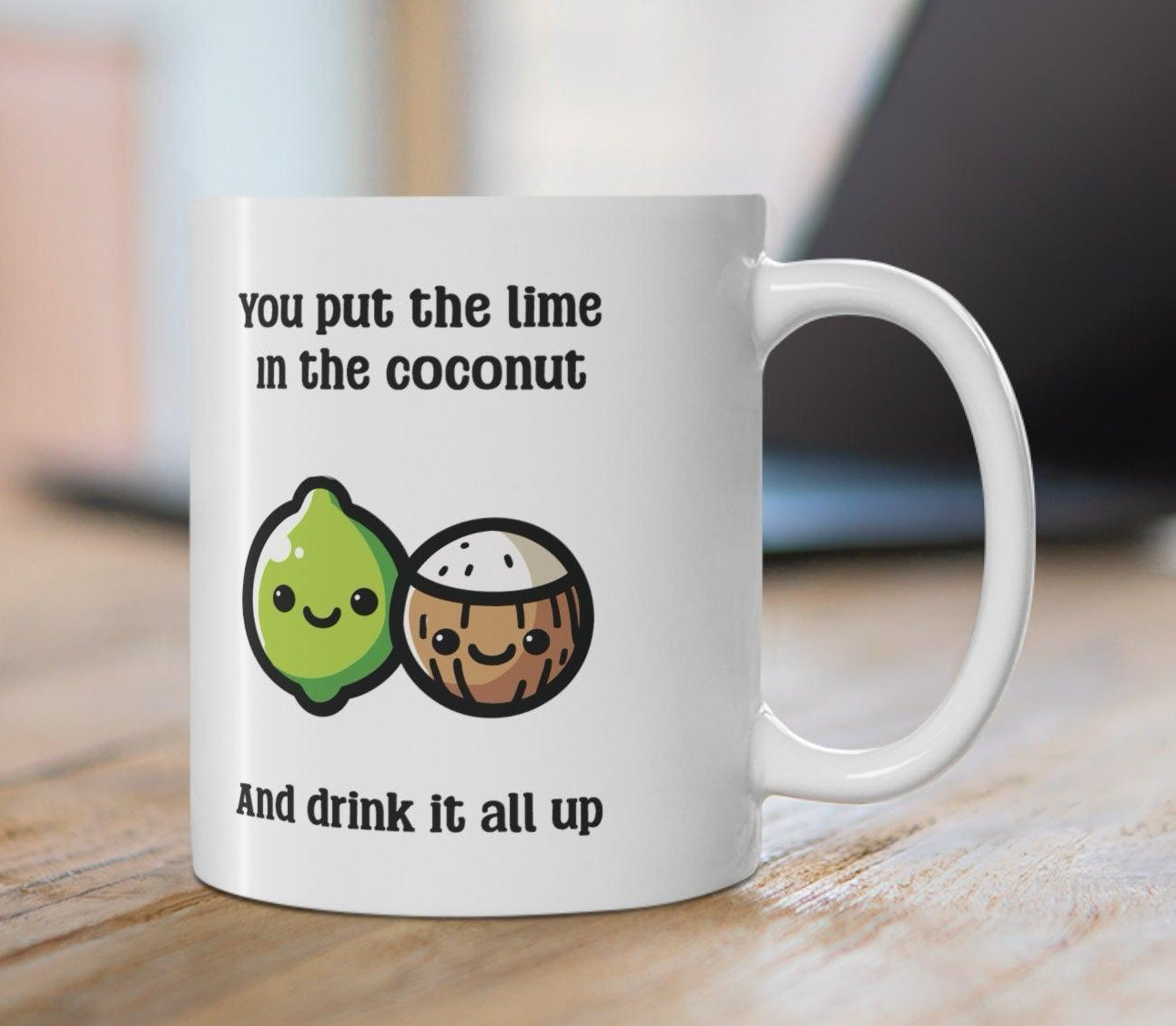 Fun ceramic mug featuring a cheerful lime and coconut illustration with the phrase 'You put the lime in the coconut and drink it all up.' A quirky gift or perfect addition to your morning coffee routine - KEOLIX 