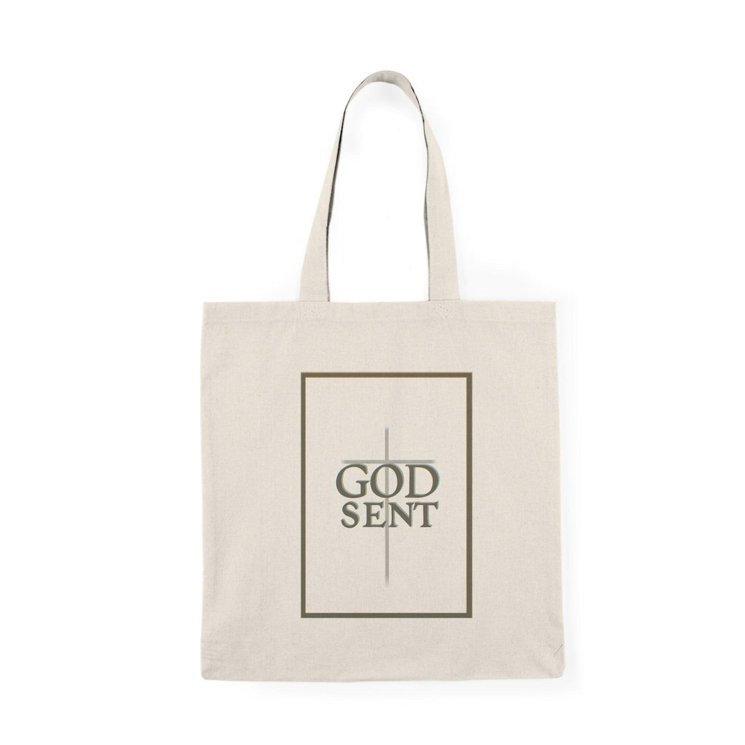 Tote bag featuring a striking design with the word 'Godsent' elegantly displayed, complemented by artistic elements that evoke a sense of faith and inspiration. The bold typography and vibrant colors create a meaningful accessory, perfect for expressing spirituality while adding style to your everyday carry."
