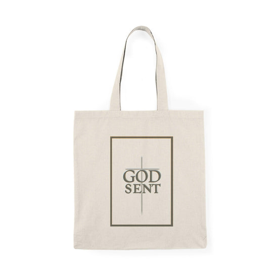 Tote bag featuring a striking design with the word 'Godsent' elegantly displayed, complemented by artistic elements that evoke a sense of faith and inspiration. The bold typography and vibrant colors create a meaningful accessory, perfect for expressing spirituality while adding style to your everyday carry."
