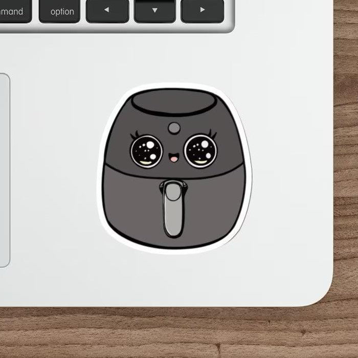 A fun waterproof sticker of a cartoon airfryer with a cute design. Perfect for cooking enthusiasts or to personalize kitchen gadgets  KEOLIX 