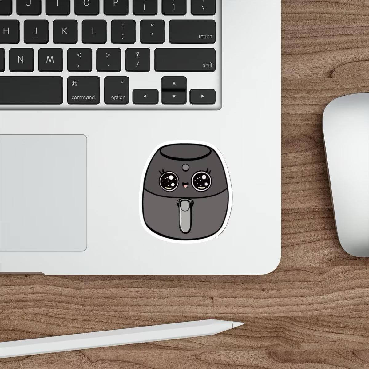 A fun waterproof sticker of a cartoon airfryer with a cute design. Perfect for cooking enthusiasts or to personalize kitchen gadgets  KEOLIX 