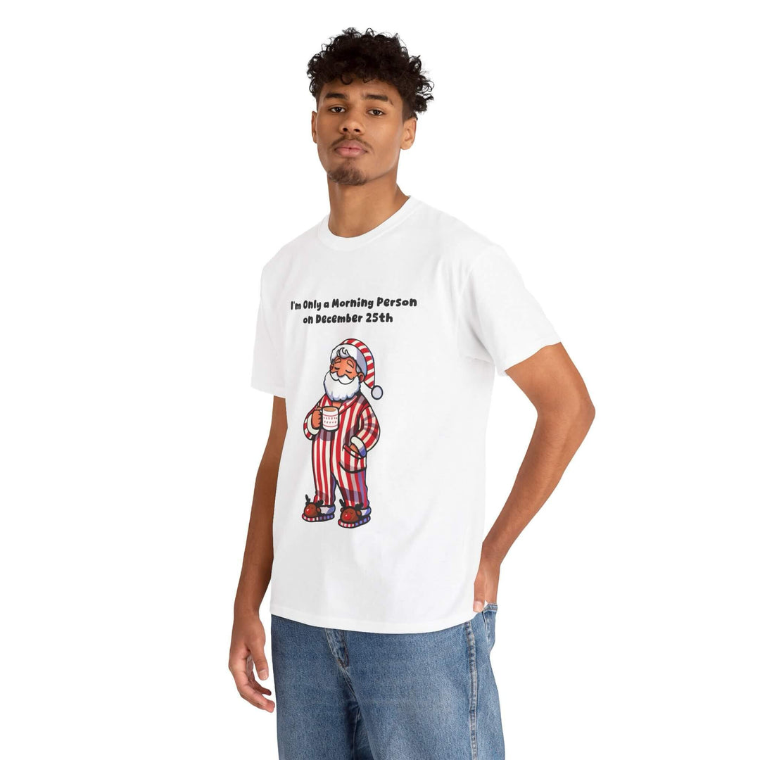 Funny Christmas T-shirt featuring cozy Santa in striped pajamas with the phrase 'I'm Only a Morning Person on December 25th.' Perfect for holiday gatherings or lounging on Christmas morning.
