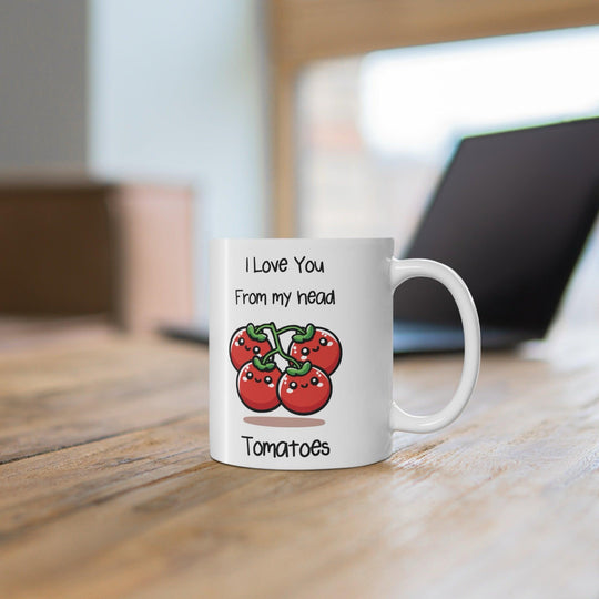 Cute white ceramic mug with a smiling tomato illustration and the pun 'I Love You from My Head Tomatoes,' ideal for spreading love with a smile."