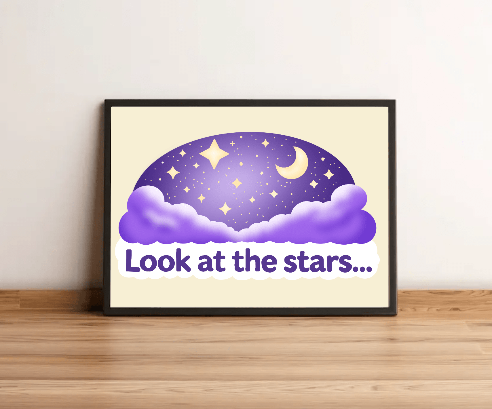 Framed artwork with a purple sky and stars on a wooden surface.