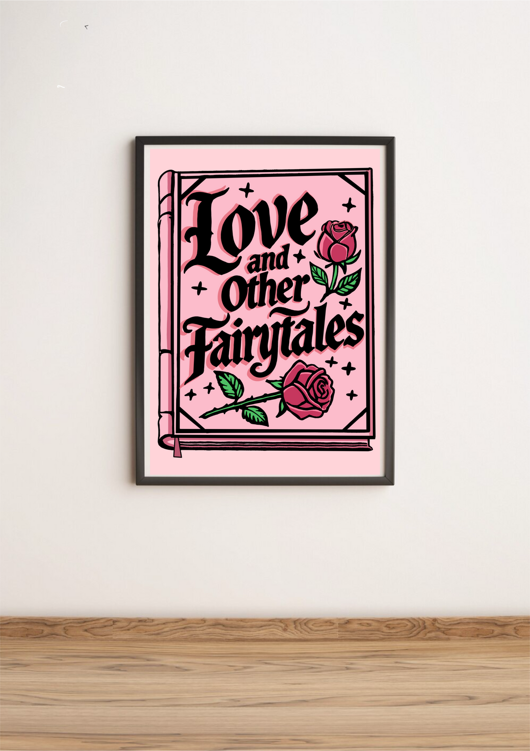 Introducing the charming "Love and Other Fairytales" print! This delightful piece rests gently against a pristine white wall on a warm wooden floor. Its bold black text pops against the lovely pink backdrop, instantly adding a romantic touch to any room. Playfully adorned with two vibrant red roses nestled amidst lush green leaves in the top right and bottom left corners, this print is beautifully framed within an elegant border. Whether you're sprucing up your space or seeking that perfect gift, this encha