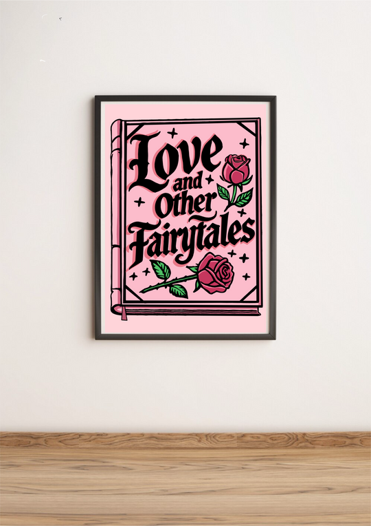 Introducing the charming "Love and Other Fairytales" print! This delightful piece rests gently against a pristine white wall on a warm wooden floor. Its bold black text pops against the lovely pink backdrop, instantly adding a romantic touch to any room. Playfully adorned with two vibrant red roses nestled amidst lush green leaves in the top right and bottom left corners, this print is beautifully framed within an elegant border. Whether you're sprucing up your space or seeking that perfect gift, this encha