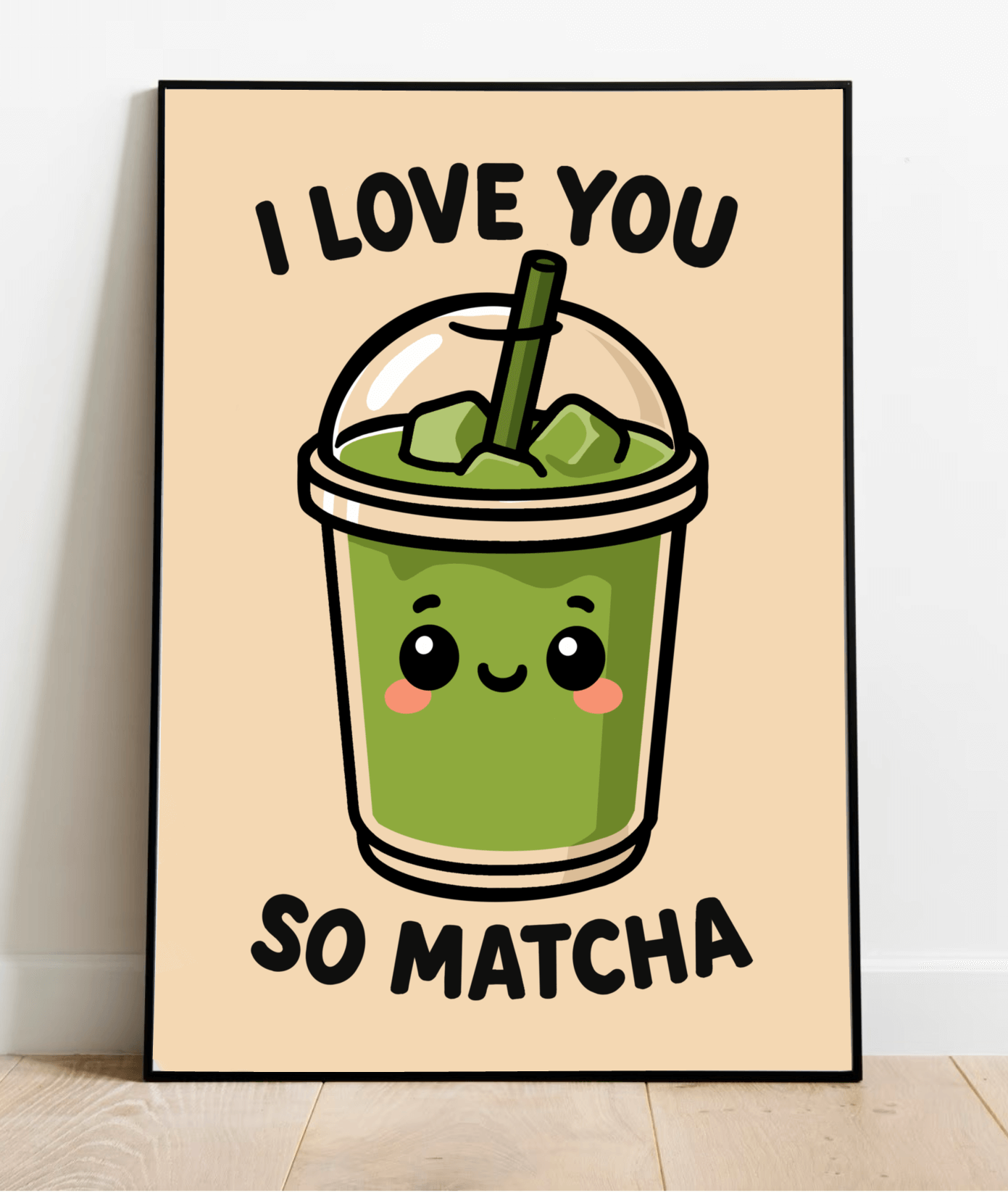Framed kawaii art print featuring an iced matcha drink with a smiling face and the words “I love you so matcha” on a neutral peach background.

